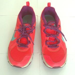 Multi-colored Nike Athletic shoes.